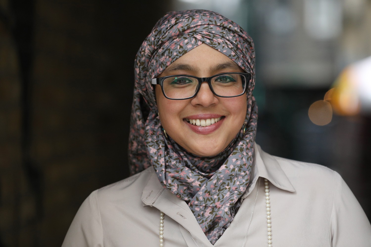 A picture of acclaimed Author Onjali-Rauf smiling